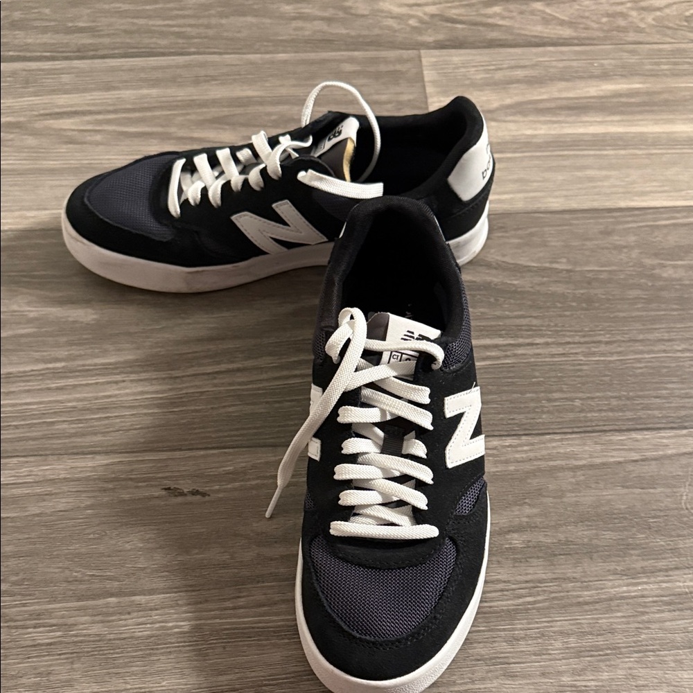 New Balance Men’s Black & White Low-Top Sneakers